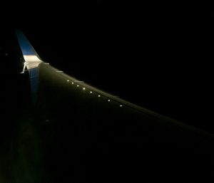 Airplane wing at night.